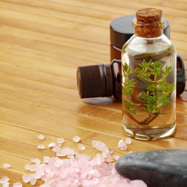 Beauty treatment items for spa procedures on wooden table